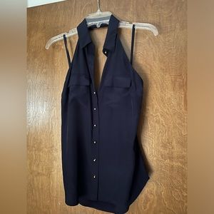 Halter top with collar and buttons.